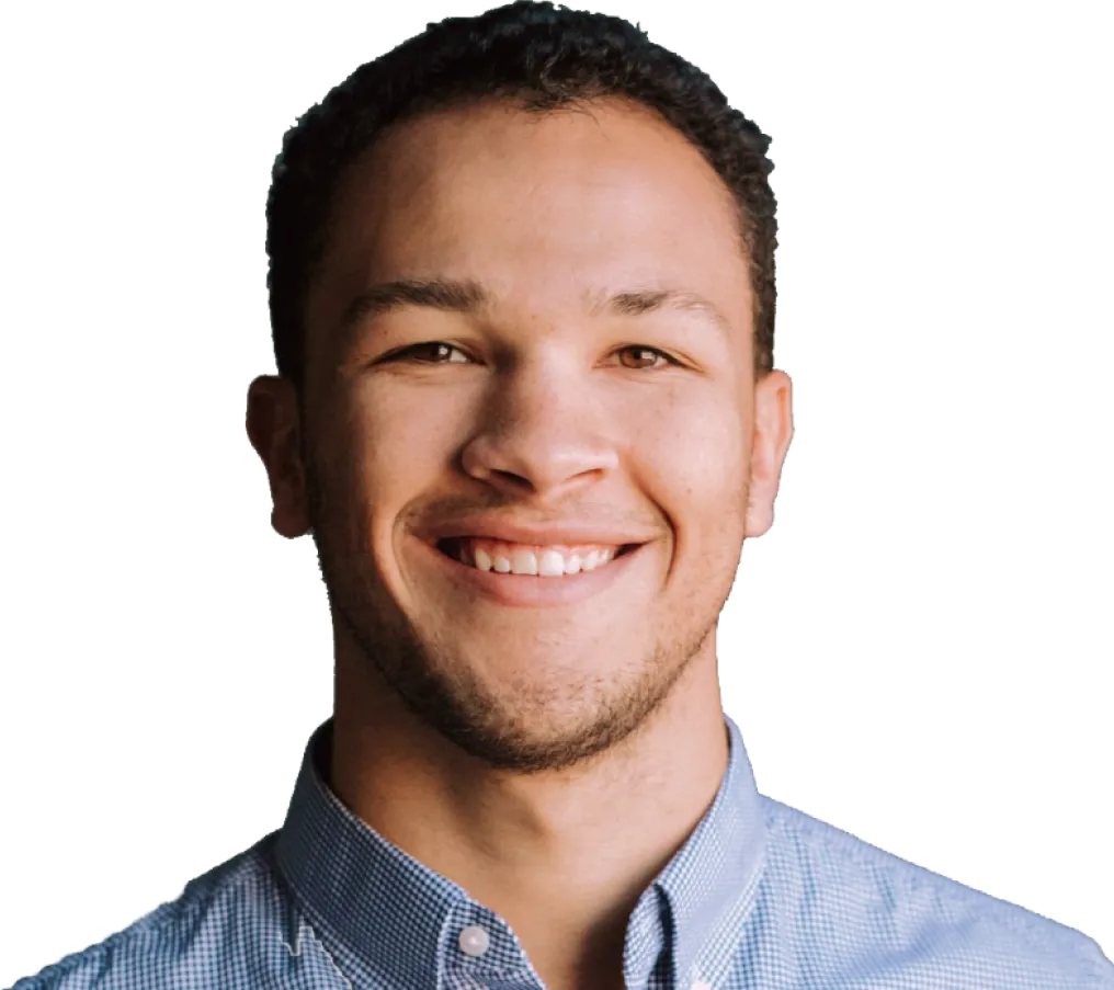 A smiling man in a blue shirt